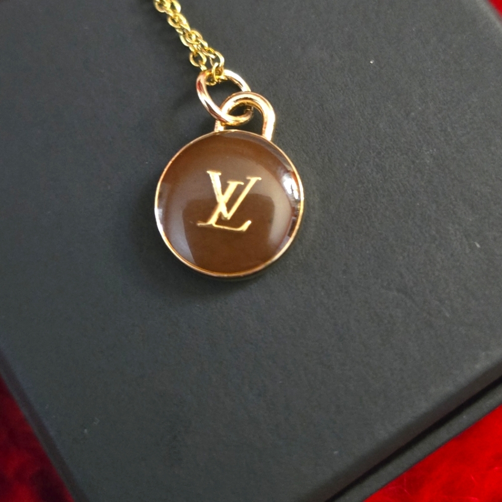 LV DOUBLE SIDED CHARM